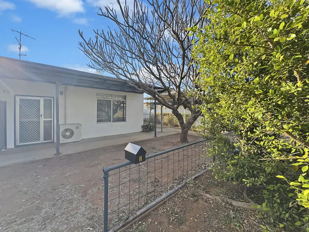 Freshly Renovated Two-Bedroom Unit with Spacious Living & Private Yard