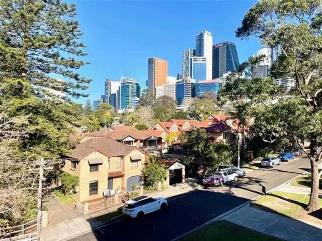Private Top-Floor Apartment with Leafy Outlook and Lock-Up Garage
