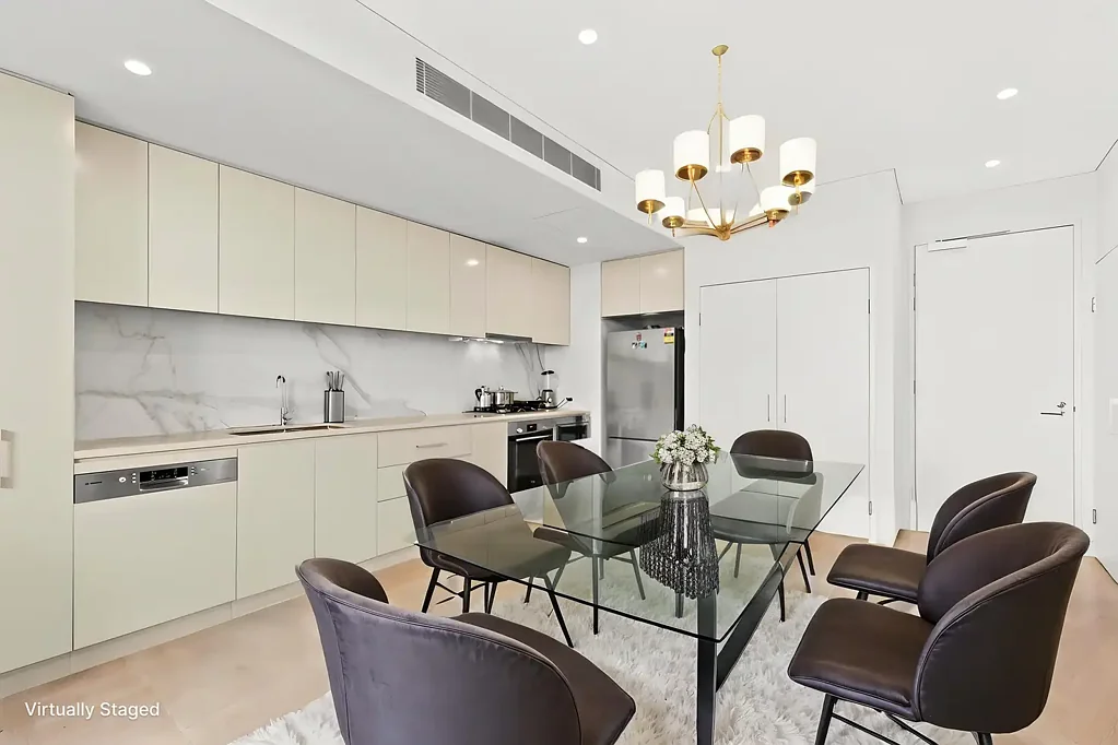 Top Floor Luxury with Sweeping District & Skyline Views
