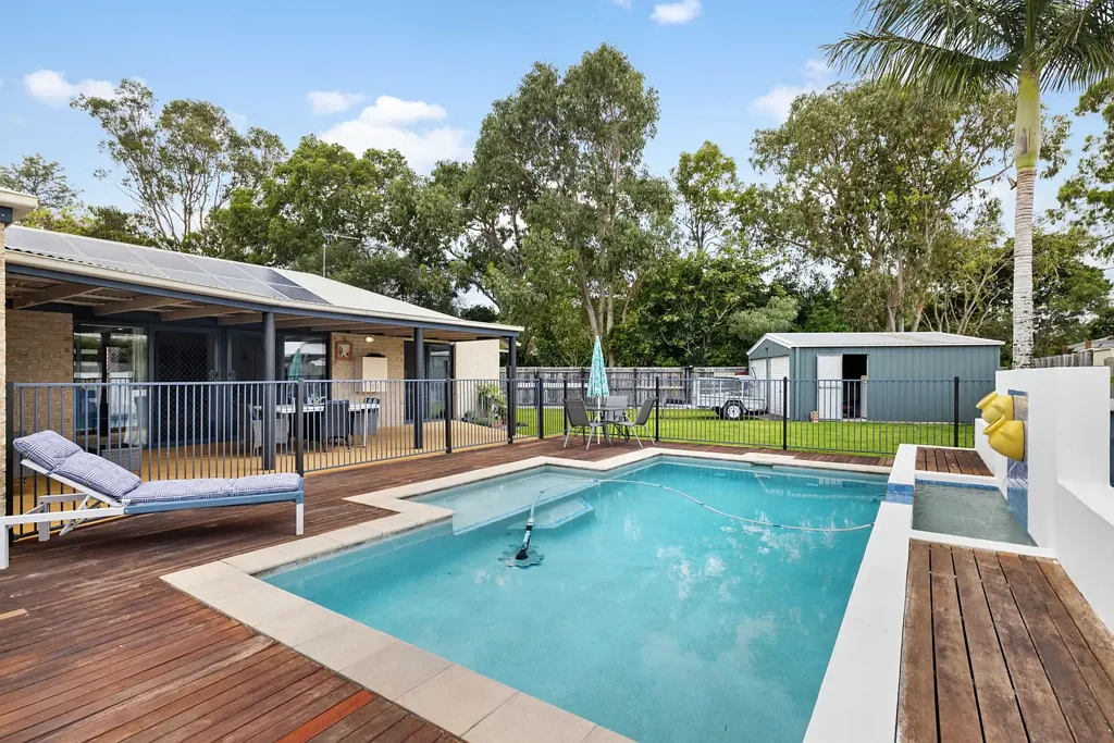 Pelican Waters 4 Bedroom Big Block With Good Side Access And A Large Shed In a Quiet Established Location Of Pelican Waters