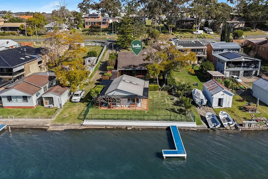 Arcadia Vale 5 Bedroom North Facing, Absolute Waterfront with Private Jetty & Guest Cabin. Bespoke Designed Home is an Entertainer's Dream. 1,094sqm with Boat Ramp Next Door