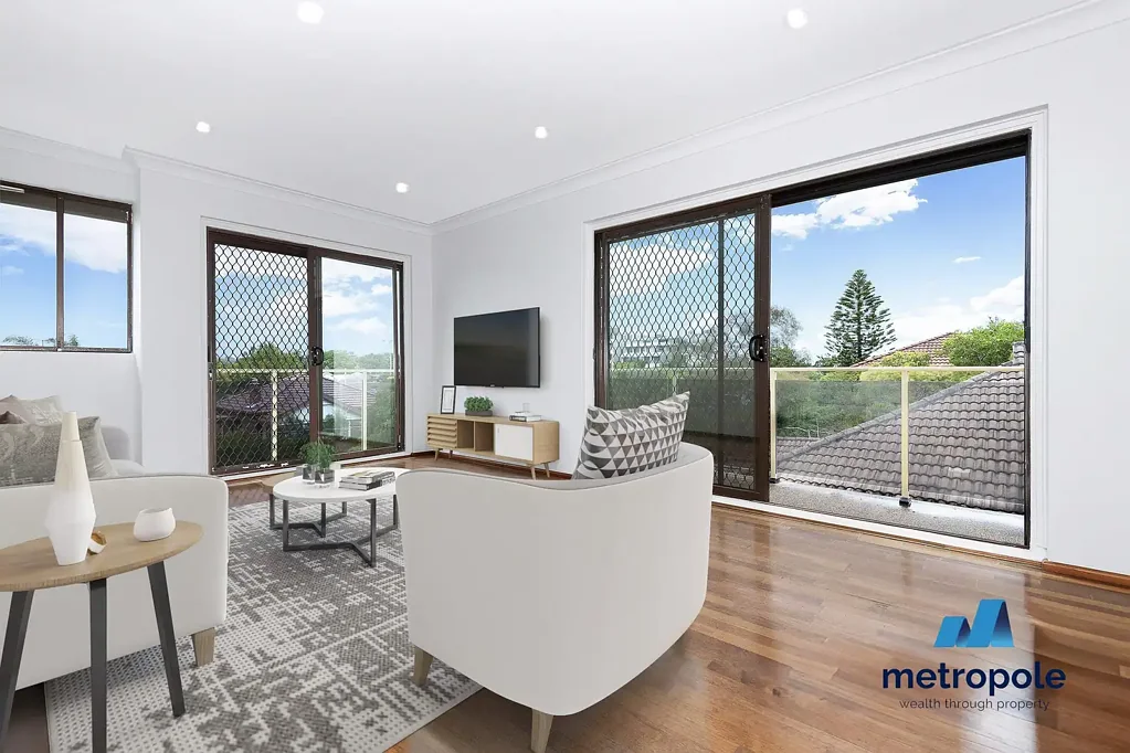 TWO BEDROOM TOP LEVEL APARTMENT WITH LOCK UP GARAGE