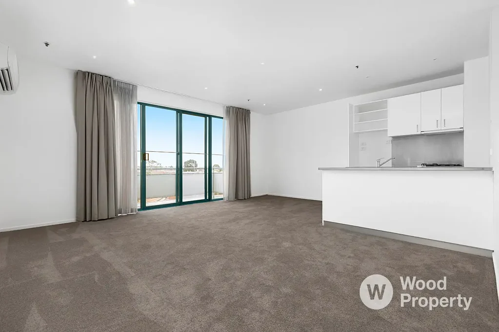 Bright Two-Story Townhouse with Balcony & Bay Views in Prime St Kilda Location