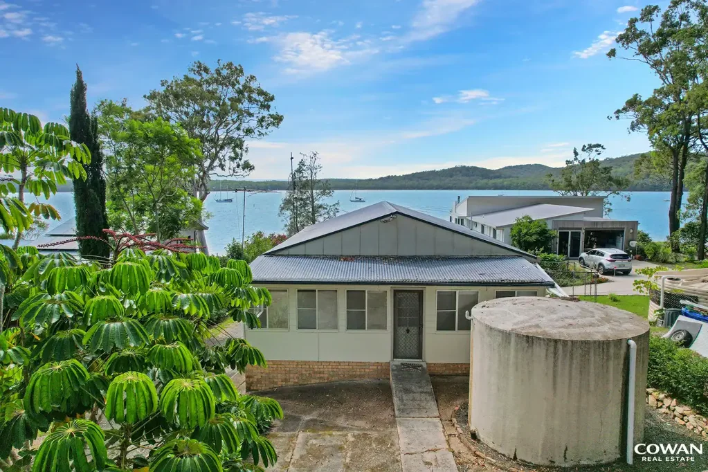 North Arm Cove 4房  Absolute Waterfront on the Pristine Waters of North Arm Cove | Private Boat Ramp & Dual Dwelling Potential