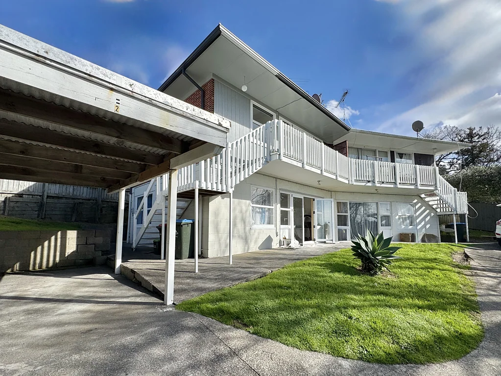 Elevated 2 bedroom unit plus carport
