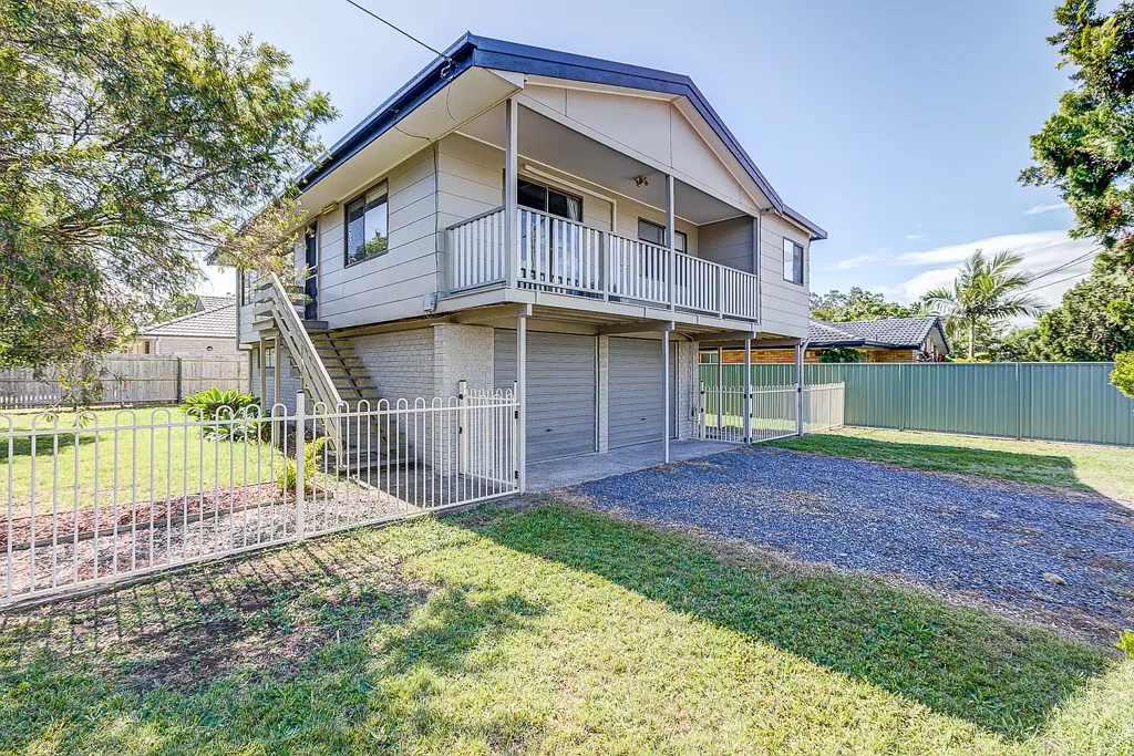 CONVENIENTLY LOCATED HOME WITH ROOM FOR THE WHOLE FAMILY