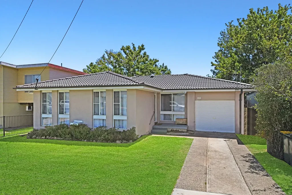 Comfortable Three Bedroom Home with Spacious Backyard