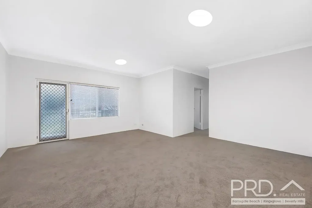 IMPRESSIVE TWO BEDROOM SECURITY UNIT WITH LOCK UP GARAGE