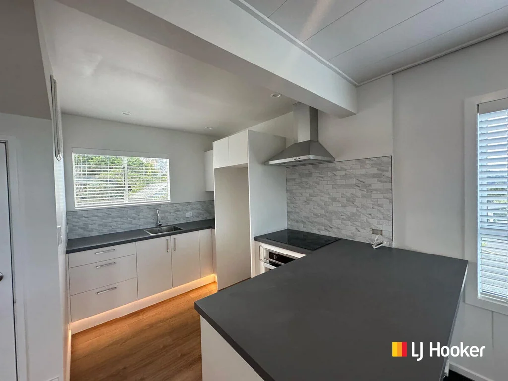 Tastefully renovated and poised for sun!