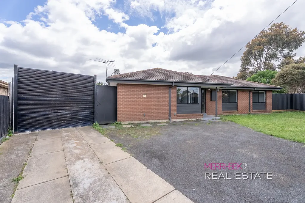 Stylish 3-Bedroom Gem with Large Backyard & Parking Galore