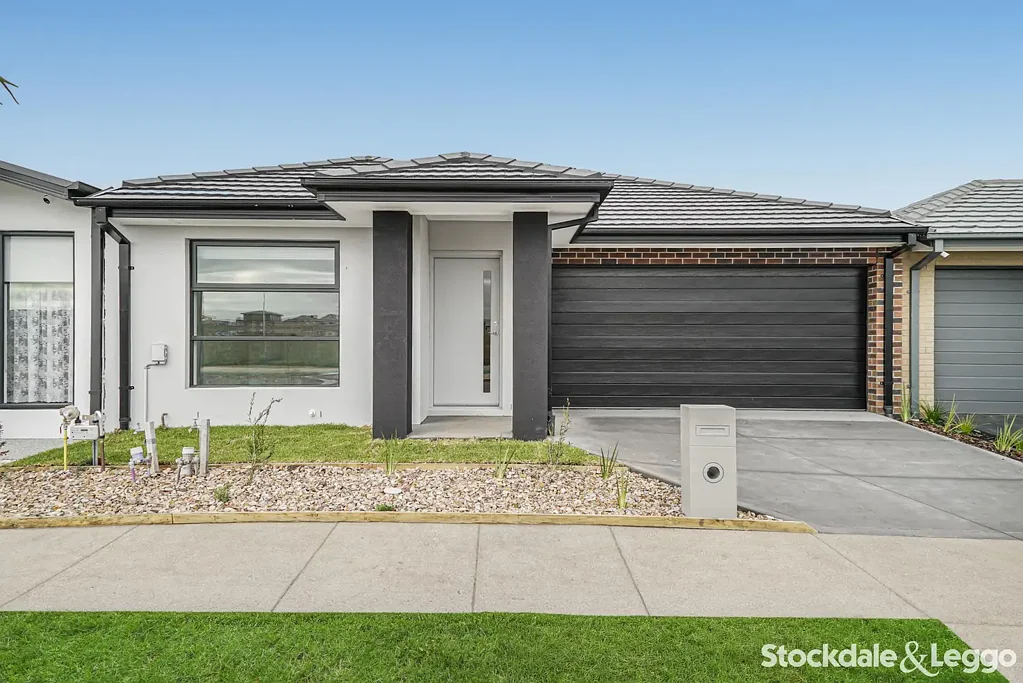 Modern Family Living in the Growing Woodstock Community!