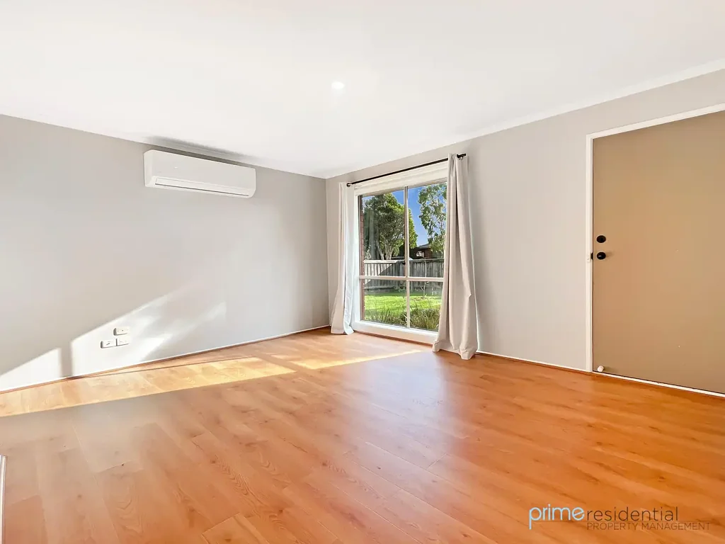 Comfortable Family Living with Spacious Front & Rear Yards