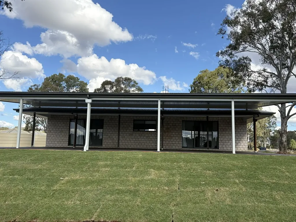 Brand new home on large acreage with triple shed