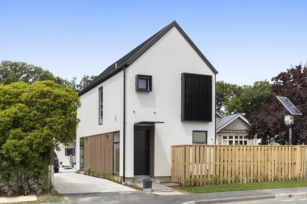 Wonderfully stylish on Warrington, with garaging AND off-street parking!