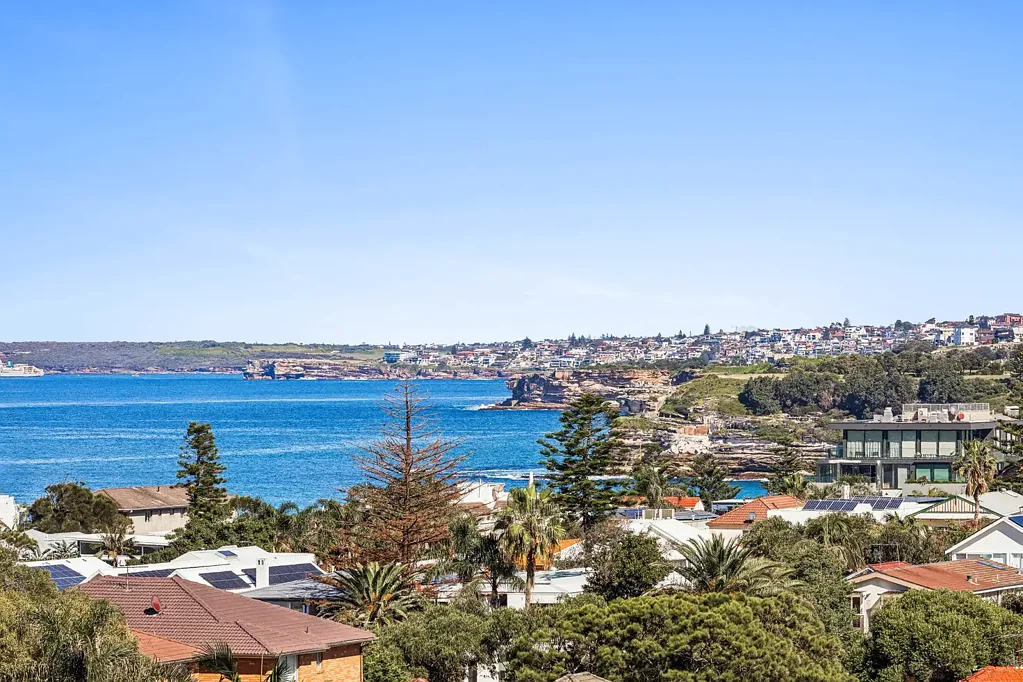 Renovated Apartment with Balcony and Ocean Views