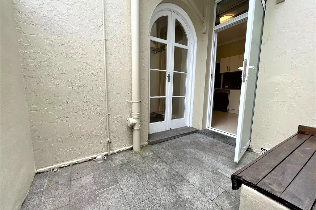 Ground floor one bed unit with paved courtyard