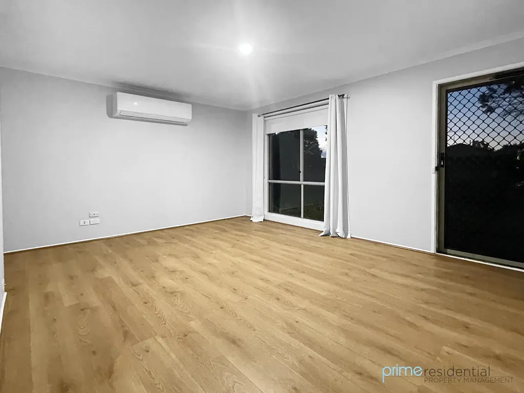 Comfortable Family Living with Spacious Front & Rear Yards