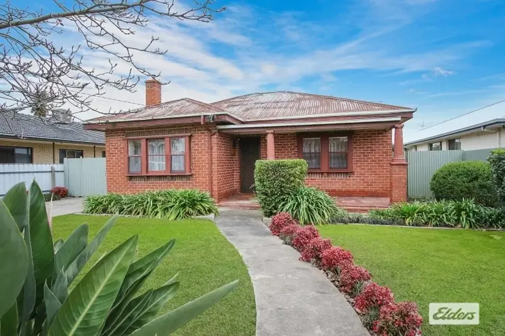 Stunning Central 3 Bedroom Red Brick Home
