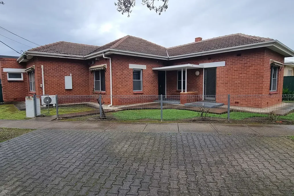 Secure & Spacious updated family home with loads of storage and space!