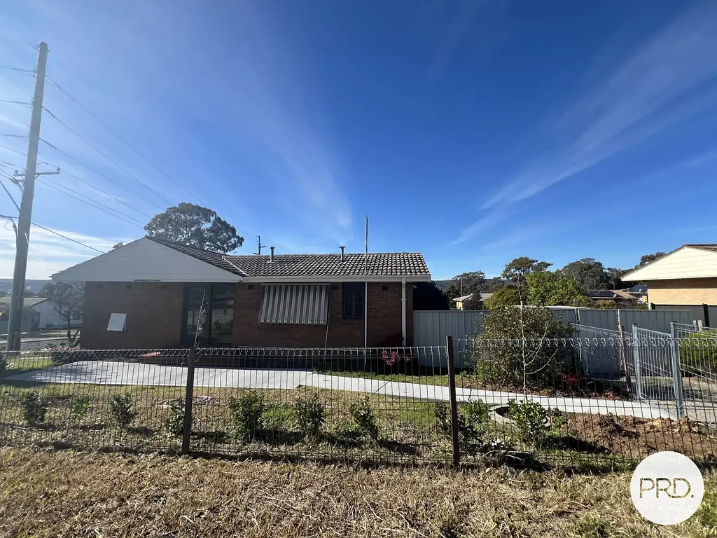 Charming Three-Bedroom Home with Brand New Flooring & Renovated Bathroom