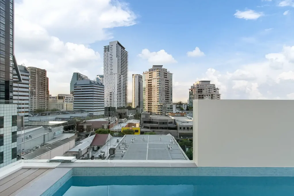 Split level penthouse living, expansive terrace & private lap pool