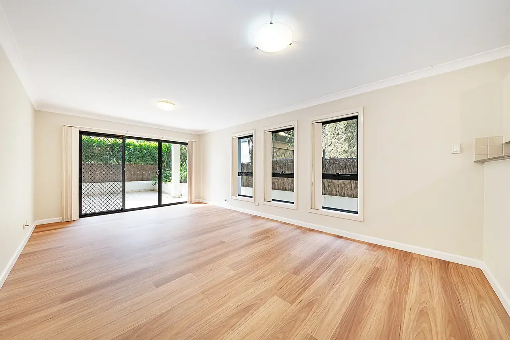 Oversized Ground Floor Three Bedroom Garden Apartment in Sought-After Resort-Style Complex
