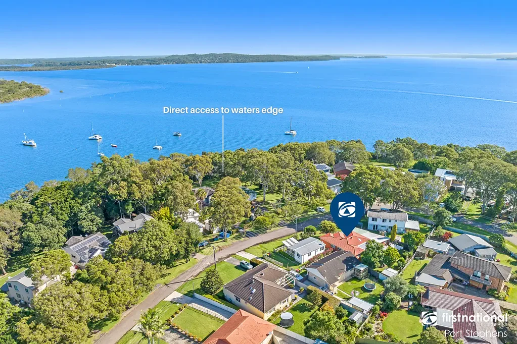 COASTAL FAMILY SIZED HOME ACROSS FROM THE WATER IN SOLDIERS POINT