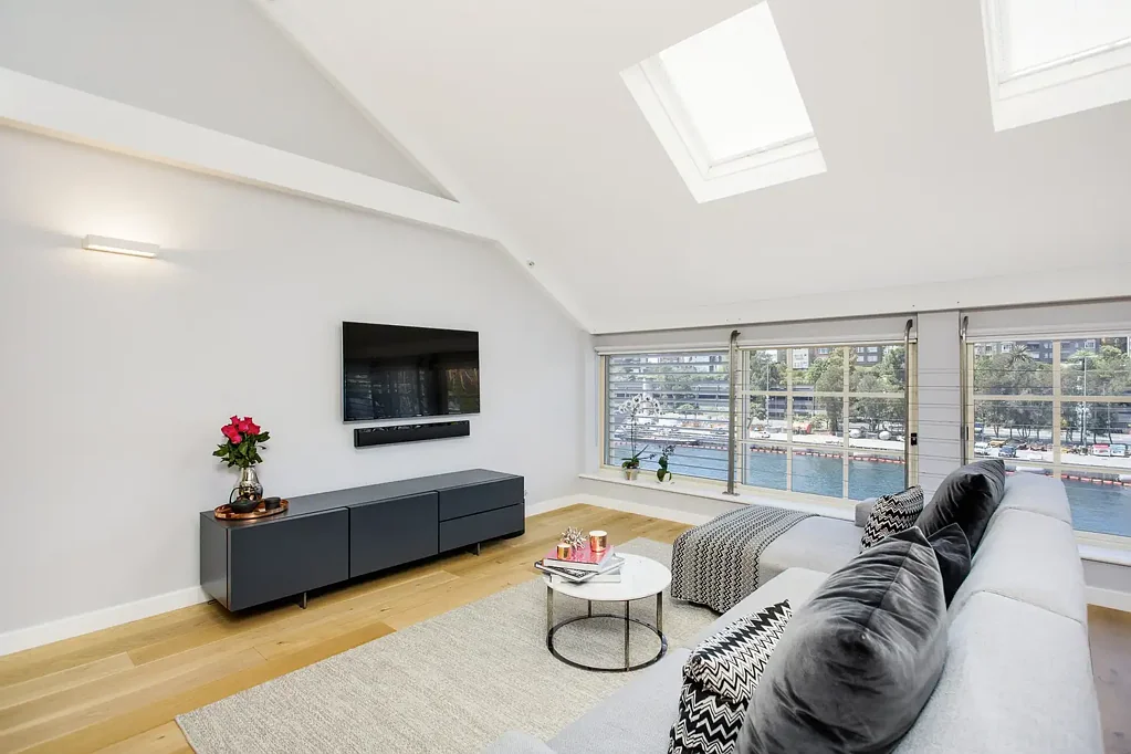 Renovated loft‑style Wharf apartment with water views