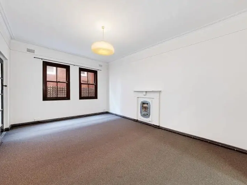 OVERSIZED TWO BEDROOM PLUS SUNROOM/STUDY!