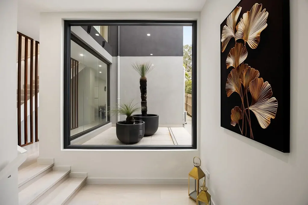 Ermington 5Zimmer Architecturally crafted tri-level home enjoys an elevated position