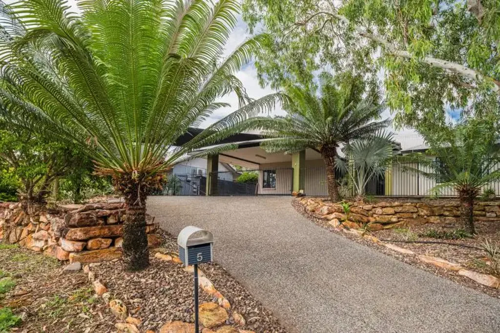 SPACIOUS AND VERSATILE FOUR BEDROOM HOME WITH POOL, PATIO, SOLAR PANELS AND PARKING!