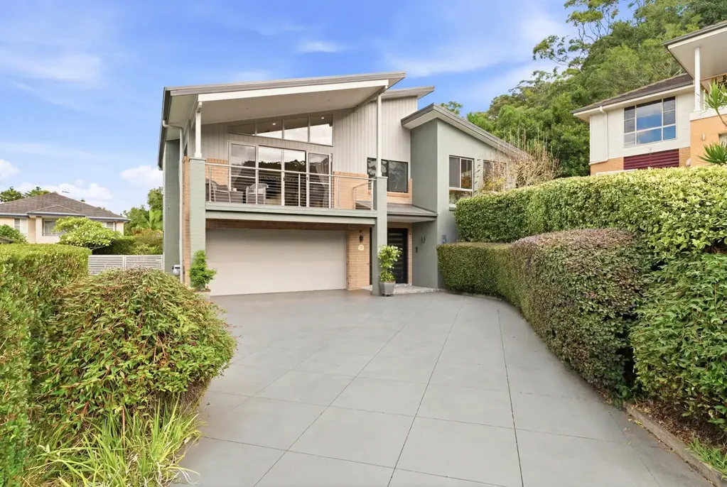 Kincumber 3ห้องนอน Tranquil Family Living in Prestigious Figtree Bay Estate