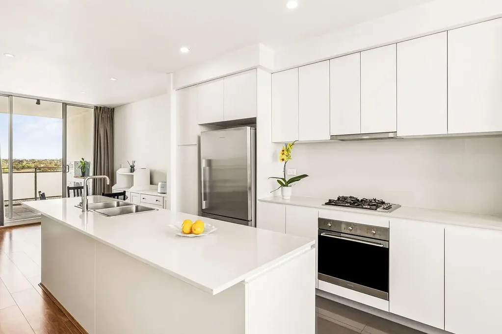 Strathfield 2ਬੈੱਡਰੂਮ Rooftop apartment with sunlit interiors, dual balconies and sweeping views