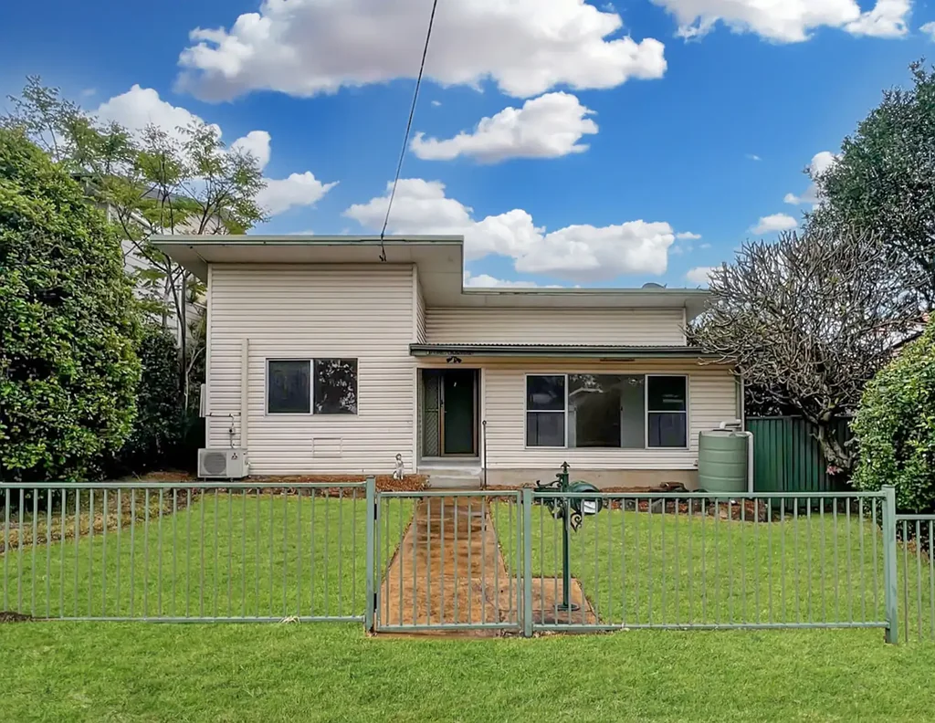 Renovated three bedroom home on a dual block with water views