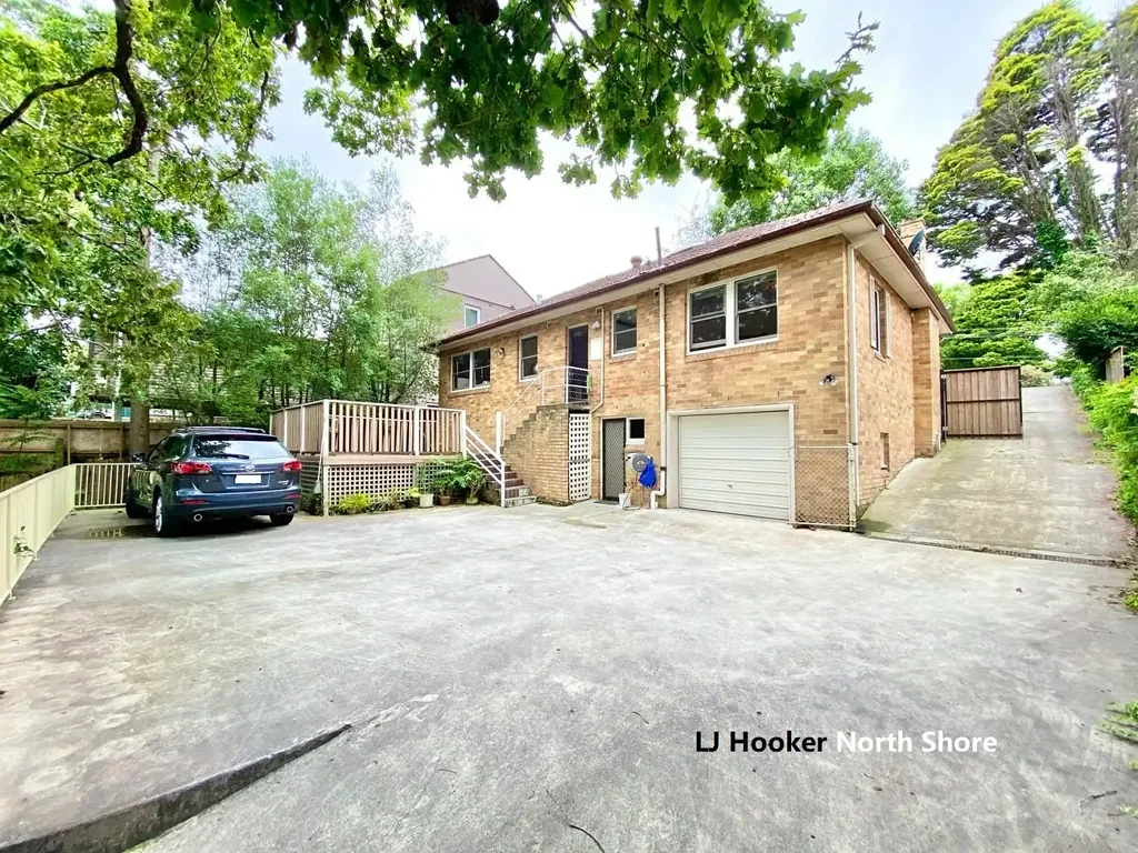 Full Brick with Sound Blocking Windows and Paved Back Yard