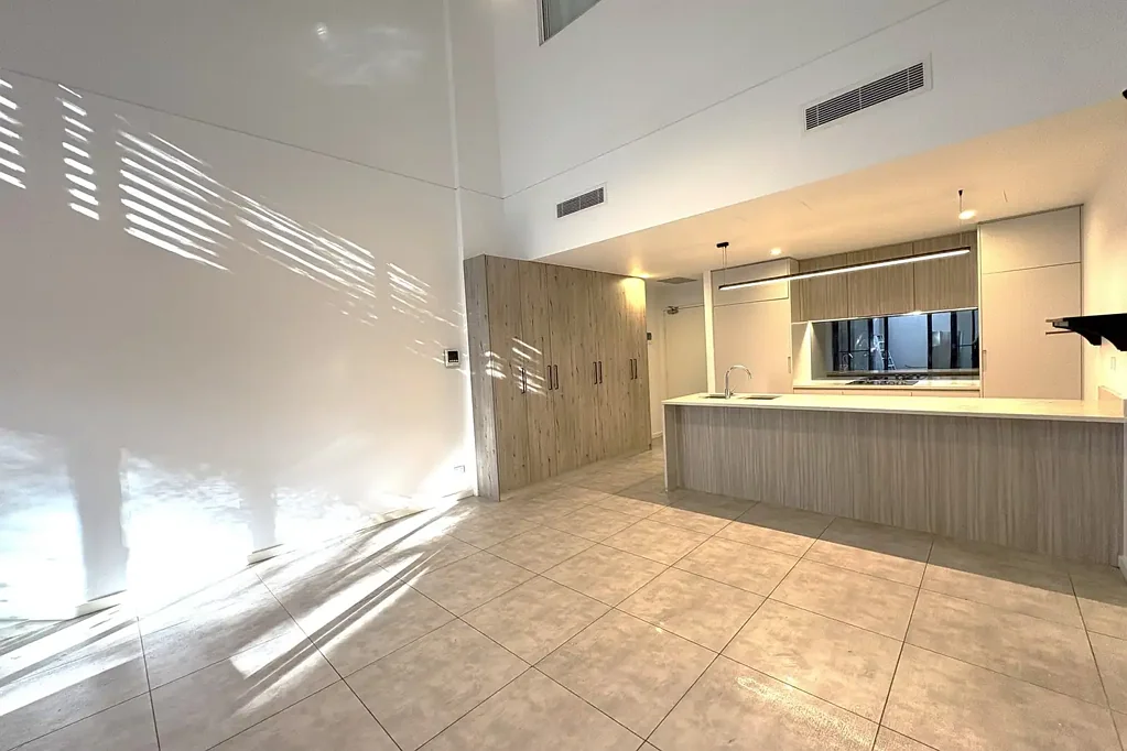 Stylish Two-Level Apartment with Courtyard in a Prime Location
