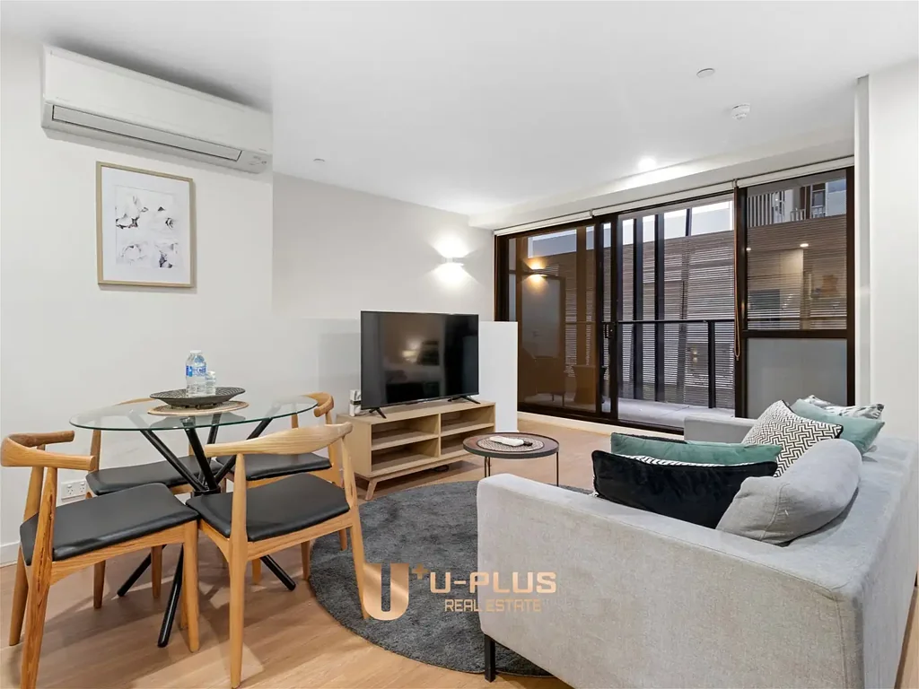 North Melbourne 2房 宽敞复式公寓，拥有别墅般的吸引力 Spacious Dual-Level Apartment with House-Like Appeal