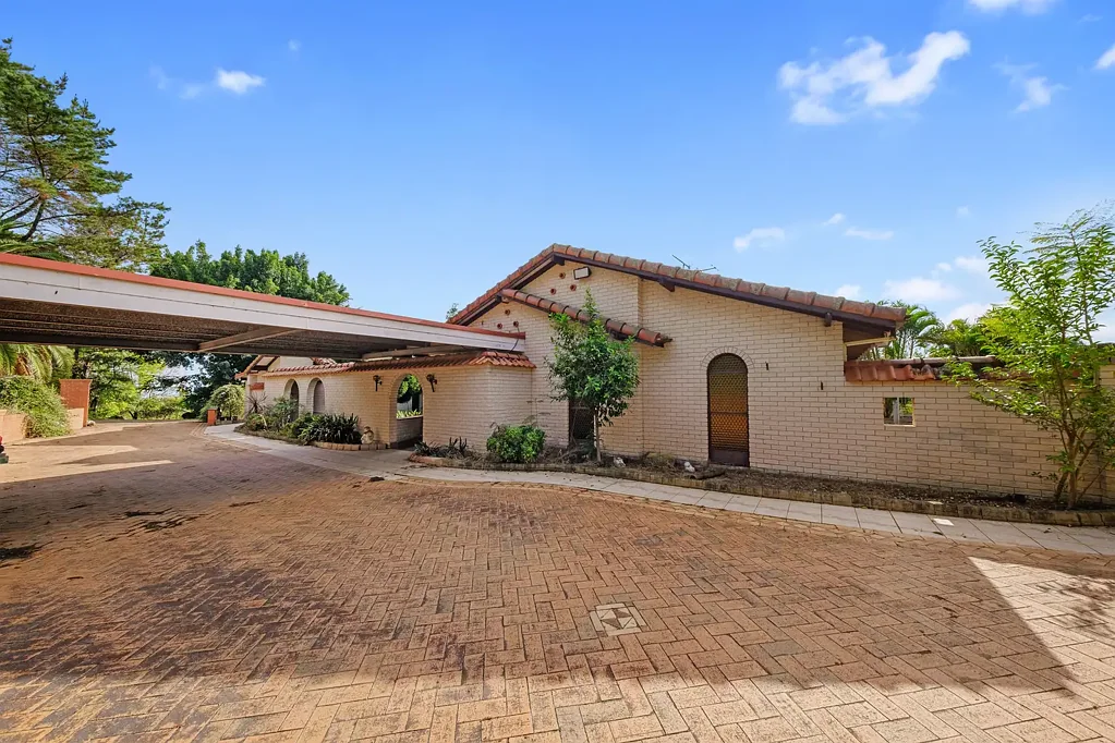 Spacious One-Level Brick Home with Storage & Multiple Living Areas