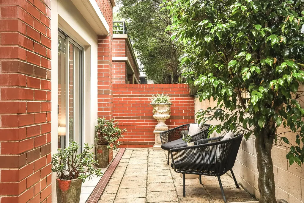 Refined Courtyard Residence with Exceptional Village Convenience