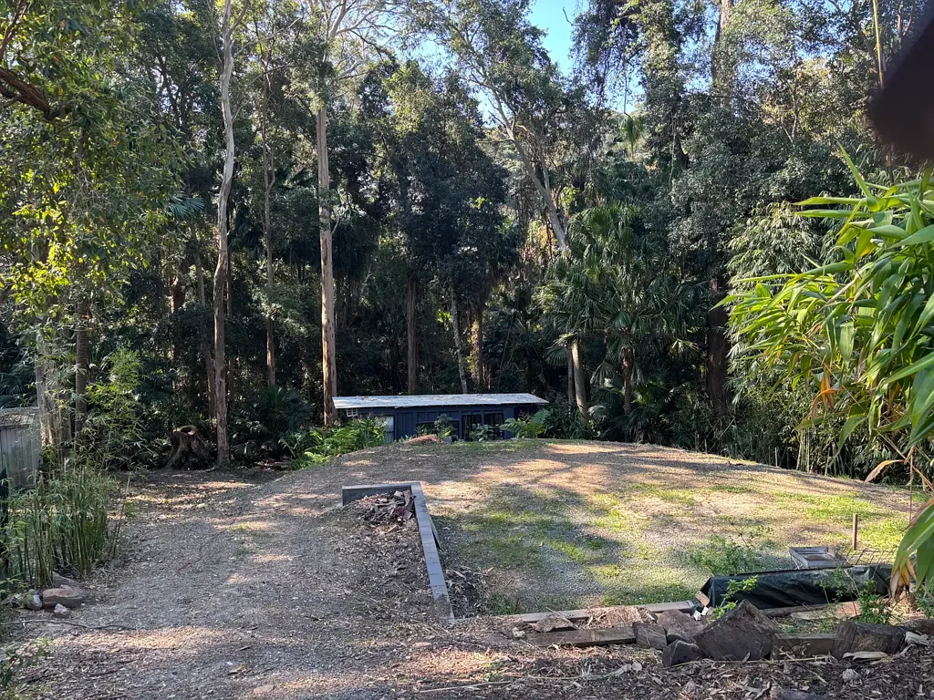Smiths Lake  Cleared North Facing land with Tiny House/Shed. Water and power on. DA approved. Quiet street near lake backing rainforest reserve