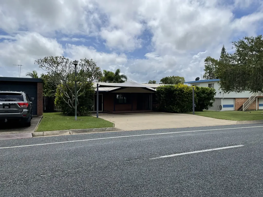 LOW-SET BRICK HOME IN PERFECT LOCATION