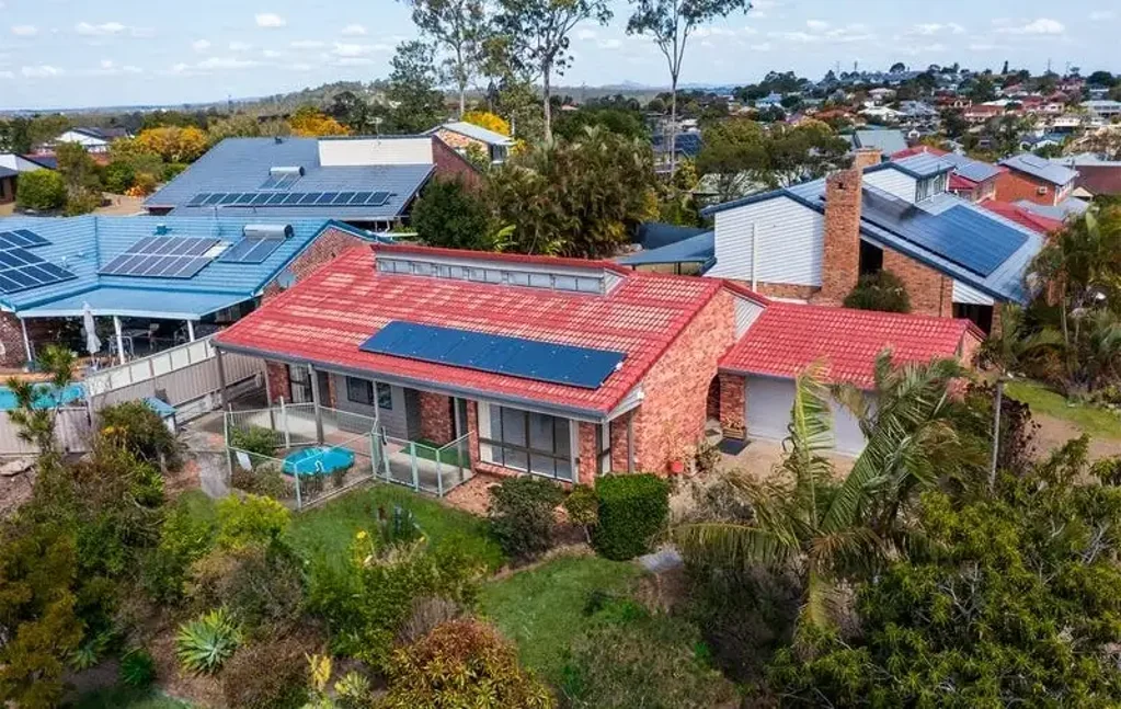 LET’S TALK – Private family retreat with spa living on a spacious corner block