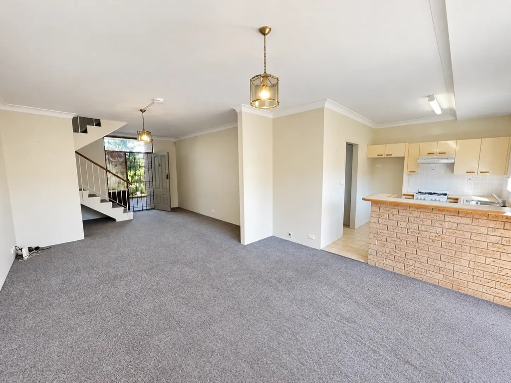 Spacious Two-Storey Townhouse with Private Courtyard & Large Lock-Up Garage