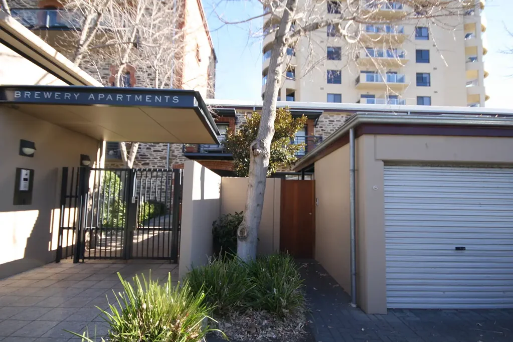 3 Bedroom Townhouse with 2 bathroom upstairs,  3 car spaces access to pool and gym.  Entrance is located off Little Capper Street off Rundle Street