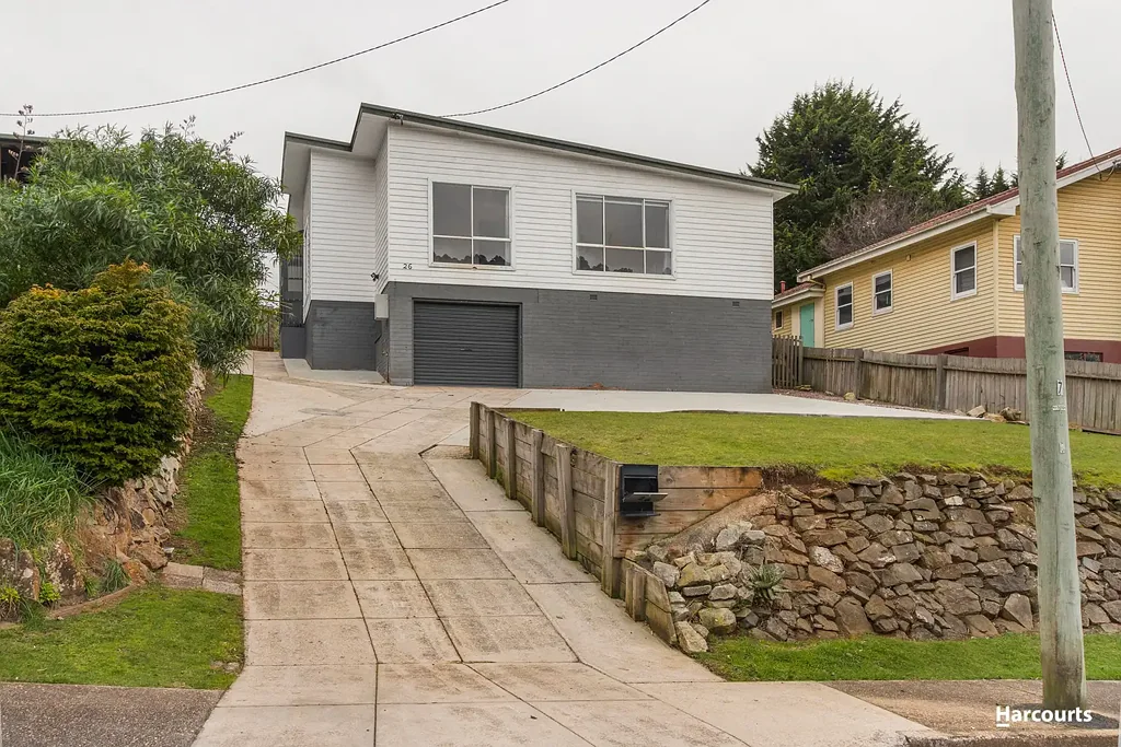 Three-Bedroom Home with Sun-Filled Living & Neat Backyard