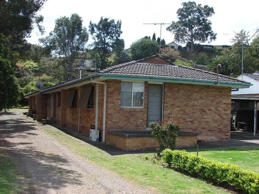 CENTRAL LOCATION THIS TIDY RESIDENTIAL FLAT WITH ITS OWN CARPORT