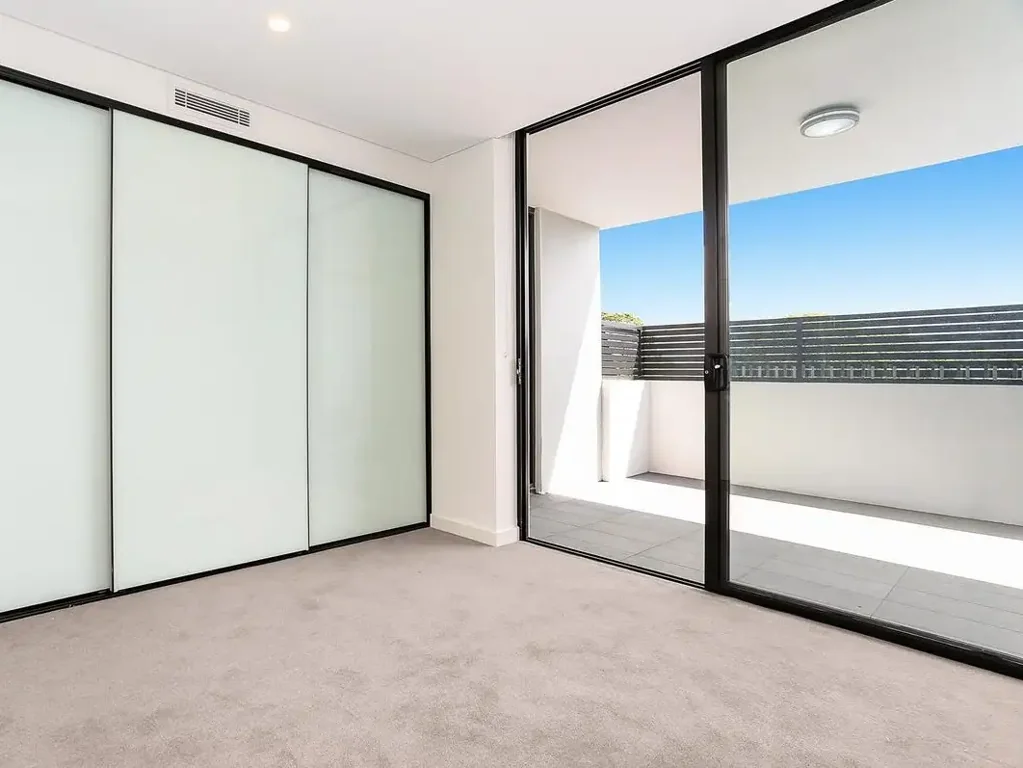 Modern Sunlit Apartment in Prime Village Location with Two Secure Car Spaces