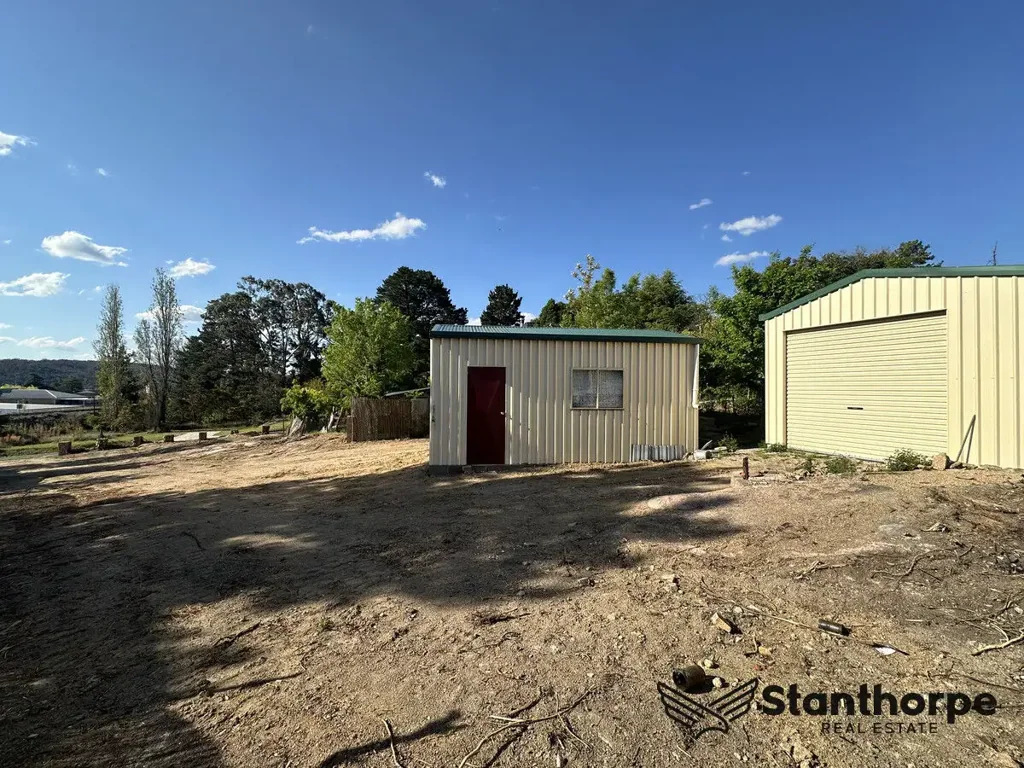 Stanthorpe  STANTHORPE - 1,026M2 BUILDING BLOCK WITH SHEDS WALKING DISTANCE TO MAIN STREET