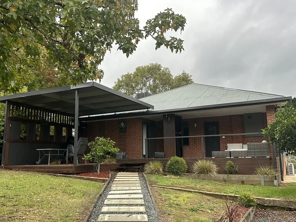 FULLY FURNISHED FRESHLY RENOVATED THREE BEDROOM HOME WITH VIEWS