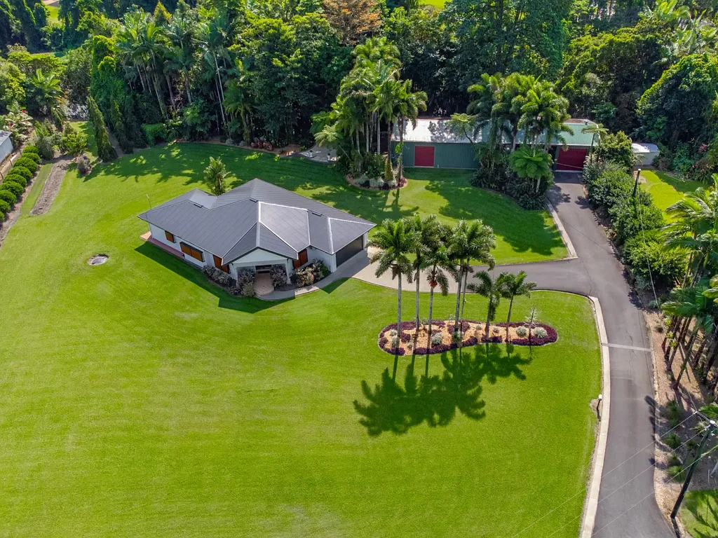 Tully 3 Bedroom FIRST TIME ON MARKET. Modern, Immaculate, Tropic Paradise , Rainforest by the Creek.  Home 15 minutes to Mission Beach.